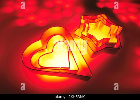 Cookie Cutters on Warm Background Stock Photo