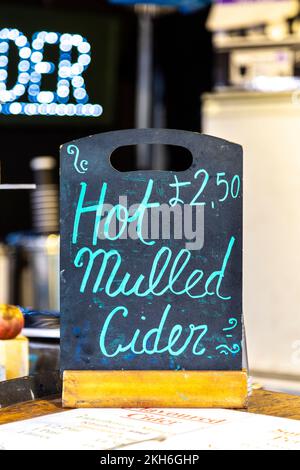 Sign for hot mulled cider at the Southbank Centre Food Market, London, UK Stock Photo
