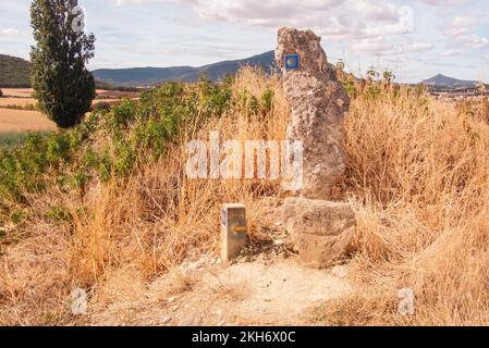 To Santiago this way. Signpost for pilgrims on the Camino in the fields near Villatuerta. Stock Photo