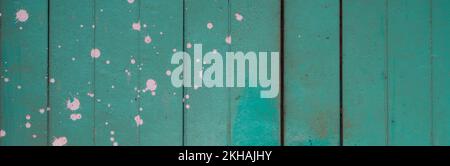 Turquoise vintage white paint stained wooden surface Stock Photo