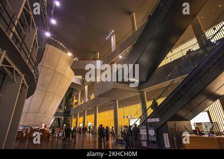 The National Art Center Tokyo interior at dusk in Roppongi, Tokyo, Japan (architect Kisho Kurokawa) Stock Photo