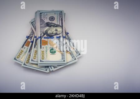 American 100 dollar banknote bundles placed on white background Stock Photo