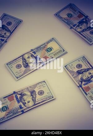 American 100 dollar banknote bundles placed on white background Stock Photo