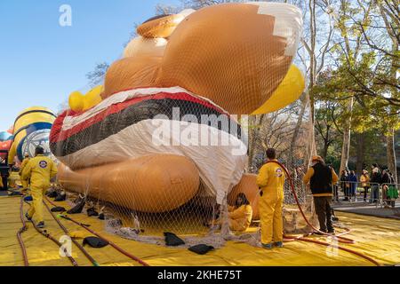 Workers work on balloons inflation for 96th Macy's Thanksgiving Day Parade on 77th street Stock Photo