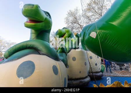 Sinclair Oil Dino and Baby Dino balloons inflated for 96th Macy's Thanksgiving Day Parade on 77th street in New York on November 23, 2022 Stock Photo