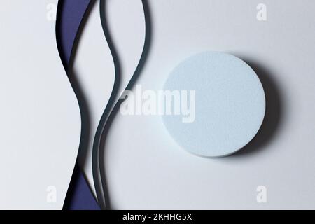 Empty round geometric shape podium platform on paper cut abstract minimal geometric shape blue color background. Abstract pale shade of blue Stock Photo
