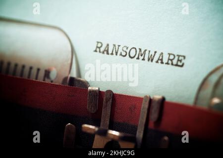 Ransomware text written with a typewriter. Stock Photo