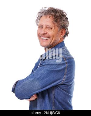 Its a feel good kinda day. Studio portrait of a happy mature man wearing a denim shirt while isolated on white. Stock Photo