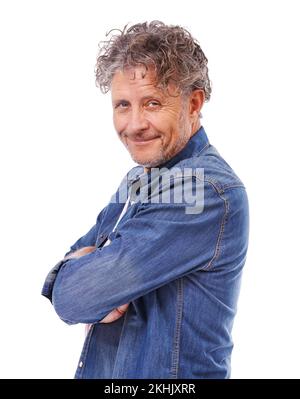 Today is my day. Studio portrait of a happy mature man wearing a denim shirt while isolated on white. Stock Photo