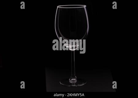 photo of an empty wine glass on a black background Stock Photo