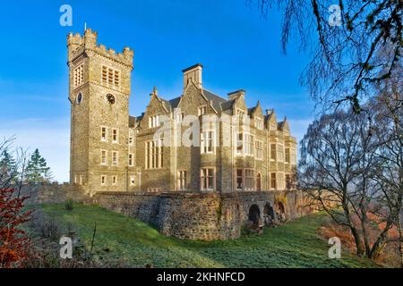 Carbisdale Castle Invershin Scotland blue sky over the building and garden in early winter Stock Photo