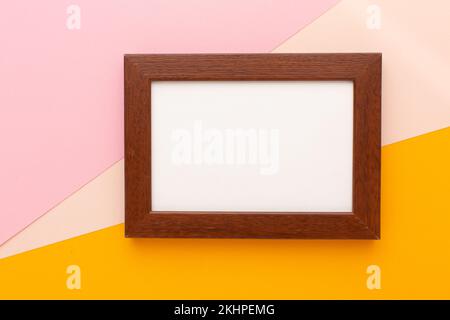 Brown frame on colored background with place for your text. High quality photo Stock Photo