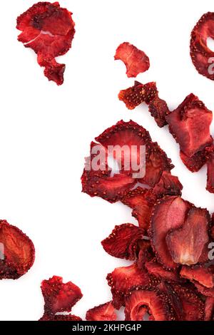 Dried strawberry fruit isolated on white background. Diet nutrition. Natural and healthy snack food concept. Vertical close-up. Stock Photo