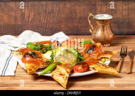 Wrapped Doner Kebab. Special kebab prepared with tomato and butter. local name beyti doner Stock Photo