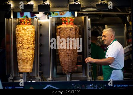 Istanbul, Turkey 10th November 2022 Turkish Kebab meat cooking on large skewers in a take away sandwich shop in Istiklal Street, Istanbul, Tukey. Stock Photo