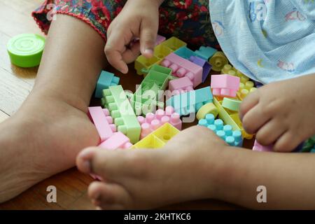 colorful building blocks on wooden table, close up  Stock Photo