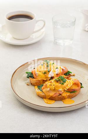 Portion of eggs benedict toast with salmon Stock Photo