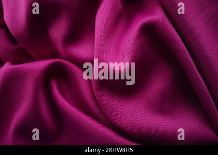 Vivd pink elastic fabric background. Stock Photo