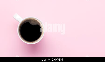 Espresso coffee on pink background. Flat lay with copy space Stock Photo