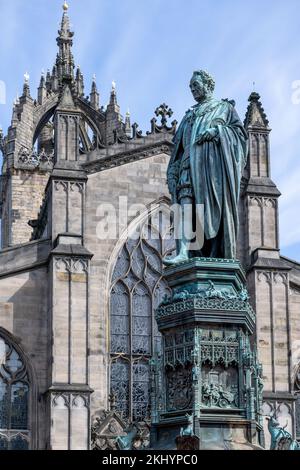 Sir Joseph Edgar Boehm's 1887 bronze statue of the 5th Duke of Buccleuch stands on an elaborate pedestal in front of St Giles Cathedral  in Edinburgh Stock Photo