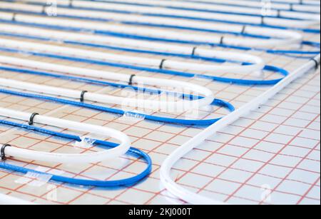 Underfloor heating system installation.  Individual Heating. Stock Photo
