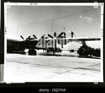 Project 22 - Operation Castle (Bikini/Enewetak) Test Activities. B-36 Decontamination Washdown. Photographs of Atmospheric Nuclear Testing at Pacific Island and Nevada Test Sites. Stock Photo