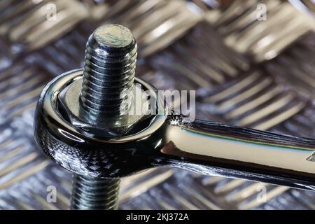 Spanner Tightening Hex Nut To Threaded Bolt Stock Photo