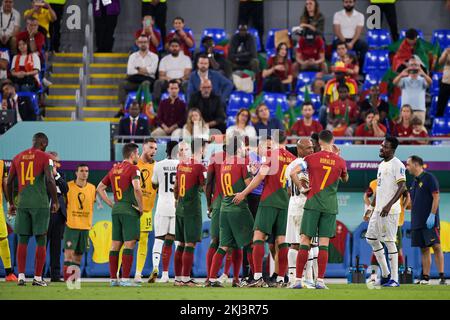 DOHA, QATAR - NOVEMBER 24: Referee Ismail Elfath discusses with players of Portugal and Ghana during the Group H - FIFA World Cup Qatar 2022 match between Portugal and Ghana at the Stadium 974 on November 24, 2022 in Doha, Qatar (Photo by Pablo Morano/BSR Agency) Credit: BSR Agency/Alamy Live News Stock Photo