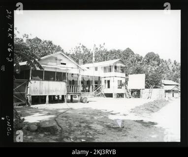 Project 24 - Operation Hardtack (Enewetak/Bikini/Johnnston Island Area) Test Activities. Tafansak village, Kusaie. Photographs of Atmospheric Nuclear Testing at Pacific Island and Nevada Test Sites. Stock Photo