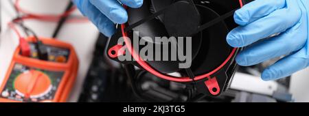 Cleaning and repairing personal computer and replacing or installing fan Stock Photo