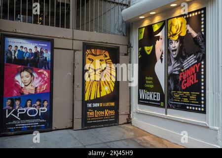 A grouping of Broadway show posters in the theater district near Time Square, 2022, NYC, USA Stock Photo