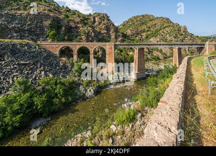 Scenic bridge over the Golo river in northern Corse, France. Stock Photo