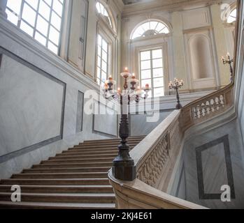 Marble staircase with antique chandeliers Stock Photo
