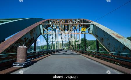 The Justice Harlan Fiske Stone Bride is seen from the Vermont side on a hot summer afternoon. Stock Photo