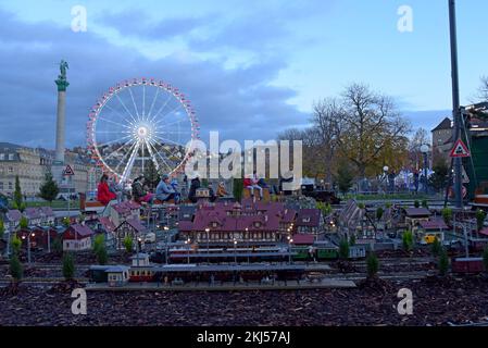 Stuttgart, Germany, 24th November 2022. People enjoying a ride on a miniature steam locomotive at Stuttgart Christmas Market. The market, with 200 illuminated and decorated stalls, a fairground and miniature railway display is open every day until 23rd December. G.P.Essex/Alamy Live News Stock Photo