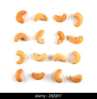 Set of roasted Cashew nuts isolated on white background. Stock Photo