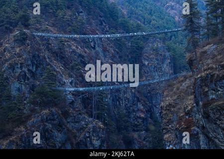 Namchebazaar, Khumjung Valley and Himalayas of Everest Base Camp Trekking in Solukhumbu, Nepal with Buddhist Prayer Flags and Wheel Stock Photo