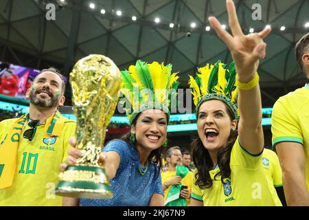 Lusail, Qatar. 24th Nov, 2022. Fans are seen before the Group G match between Brazil and Serbia at the 2022 FIFA World Cup at Lusail Stadium in Lusail, Qatar, Nov. 24, 2022. Credit: Lan Hongguang/Xinhua/Alamy Live News Stock Photo