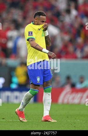 Lusail, Qatar. 24th Nov, 2022. Soccer: World Cup, Brazil - Serbia, Preliminary round, Group G, Matchday 1, Lusail Iconic Stadium, Neymar of Brazil pulls his shirt over his face. Credit: Robert Michael/dpa/Alamy Live News Stock Photo