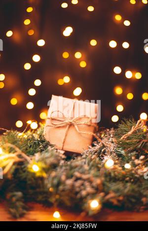 Small christmas gift wrapped in craft paper Stock Photo