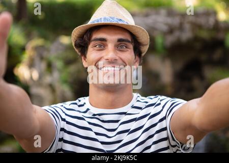 happy amazed man taking a selfie Stock Photo