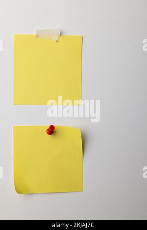 Yellow sticky memo notes and copy space on white background Stock Photo
