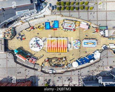 A drone view of fairground rides at Cardiff Bay, Wales Stock Photo