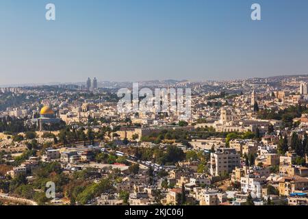 Modern Jerusalem city skyline and Dome of the rock and Al-Aqsa Mosque in old walled city of Jerusalem, Israel. Stock Photo