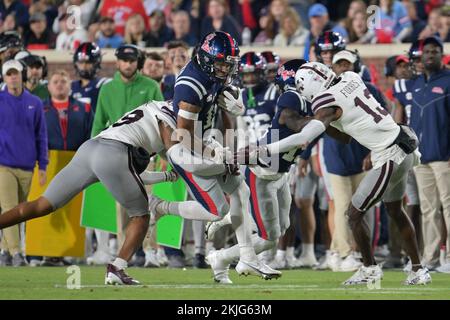 Oxford, MS, USA. 24th Nov, 2022. Mississippi State Bulldogs wide receiver Jaden Walley #11 carries the ball and gets tackled by Mississippi State Bulldogs defense during the egg bowl game between the University of Mississippi Rebels and the Mississippi State University Bulldogs at Vaught Hemingway Stadium in Oxford, MS. Rebs leads the 1st half against Bulldogs, 16-14 Patrick Green/CSM/Alamy Live News Stock Photo