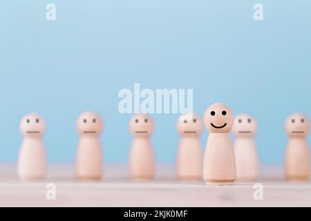 Smile emoticon icons face happy symbol on wooden human , Services and Customer satisfaction survey concept Stock Photo