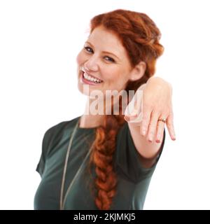 He finally popped the question. Portrait of a beautiful young woman showing off her engagement ring. Stock Photo