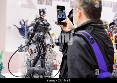 Chiba, Japan. 25th Nov, 2022. A visitor takes a photograph of action figures during the Tokyo Comic Con 2022 at Makuhari Messe International Exhibition Hall in Chiba, near Tokyo. After three years, the Japanese versions of the San Diego Comic-Con (U.S.) returned to Japan; the last event was held in 2019. Tokyo Comic Con runs from November 25 to 27. (Credit Image: © Rodrigo Reyes Marin/ZUMA Press Wire) Credit: ZUMA Press, Inc./Alamy Live News Stock Photo