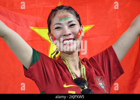 Qatar. 24th Nov, 2022. Doha, Katar. 24th Nov, 2022. Portuguese female fan, soccer fan, from China. Portugal (POR) - Ghana (GHA) 3-2 Group Stage Group H on 24.11.2022, Stadium 974 Football World Cup 2022 in Qatar from 20.11. - 18.12.2022 ? Credit: dpa/Alamy Live News Credit: dpa picture alliance/Alamy Live News Stock Photo