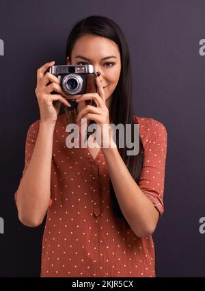 Shes beautiful in her casual nature. Studio shot of an attractive young woman. Stock Photo